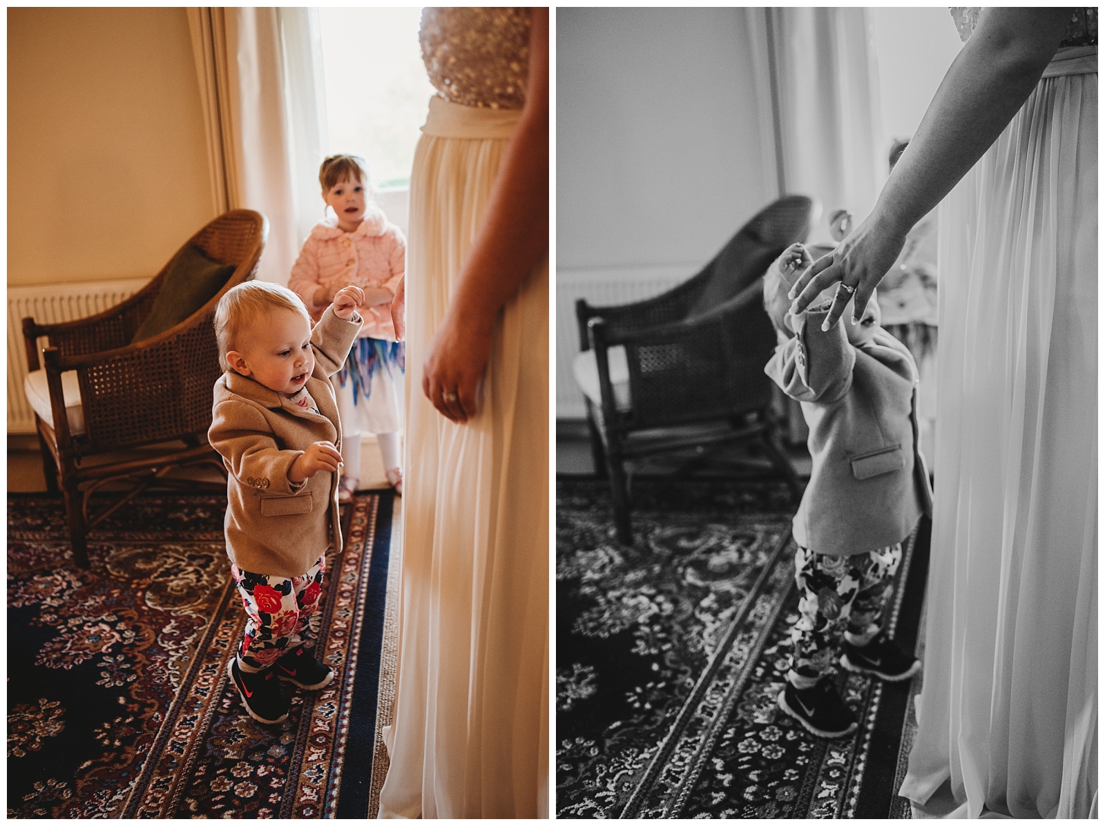 Toddler girl reaching up to Mother's outstretched hands as she finishes getting into wedding dress